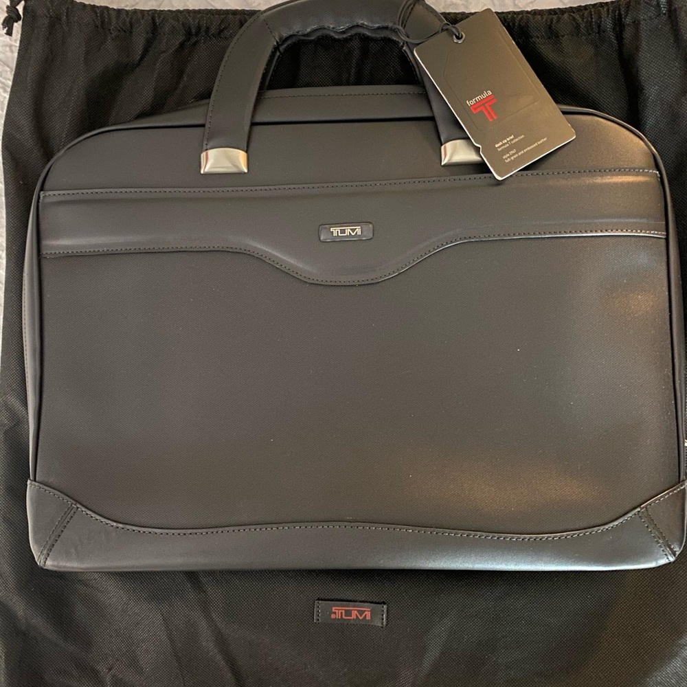 TUMI ALL LEATHER BRIEFCASE/FOLIO